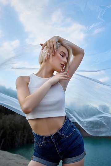 perfect-blonde-woman-short-hair-fashion-woman-poses-summer-nature-sunny-day-red-nail-manicure_91497-7947